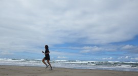 Running On The Beach Wallpaper Download Free