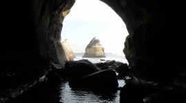 Beach With Caves Photo Free#1