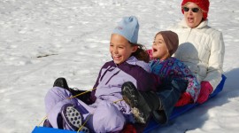 Children On A Sled Photo