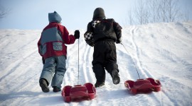 Children On A Sled Photo Download
