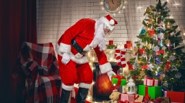 Santa Claus And Tree Wallpaper