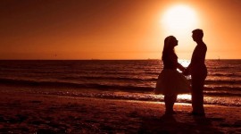 Lovers At Intimate Sunset Photo