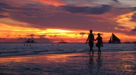 Lovers At Intimate Sunset Photo Download
