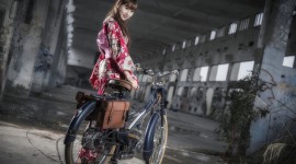4K Girl On A Bicycle Aircraft Picture