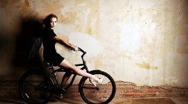 4K Girl On A Bicycle Image