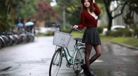 4K Girl On A Bicycle Photo Free