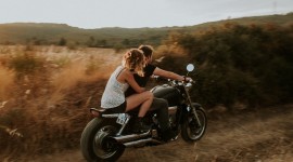 Couple Motorcycle Love Wallpaper