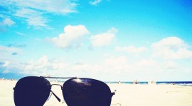 Glasses On Sand Picture Download