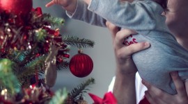 Children Decorate The Christmas Tree For IPhone