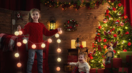 Children Decorate The Christmas Tree Image