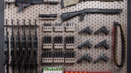 Weapons On The Wall Wallpaper Download Free