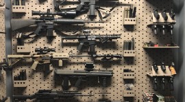 Weapons On The Wall Wallpaper For IPhone Download