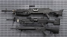 Weapons On The Wall Wallpaper For IPhone Free