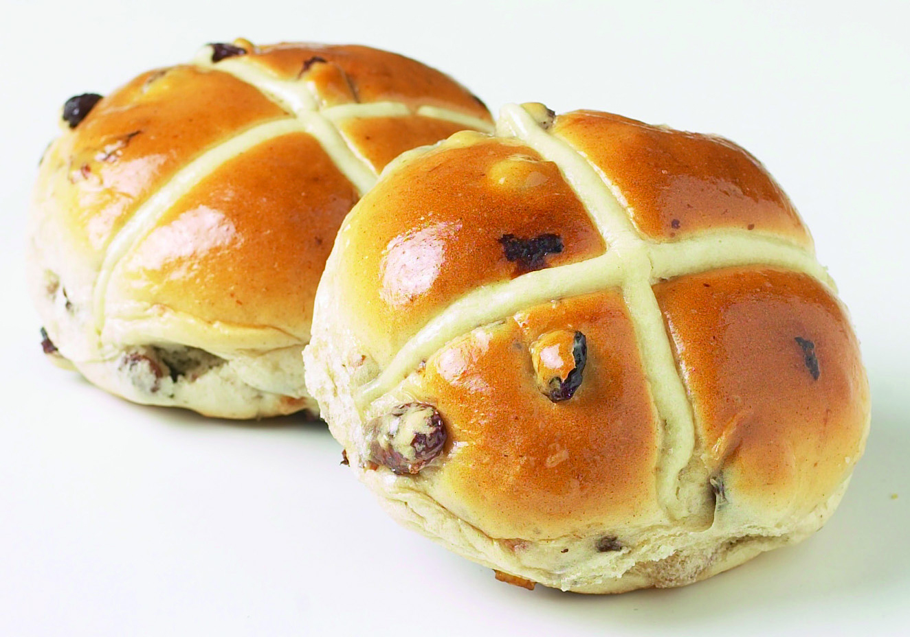 Булочка с изюминкой. Hot Cross buns в Великобритании. Hot Cross buns булочки. Английские пасхальные крестовые булочки. Пасхальные крестовые булочки.